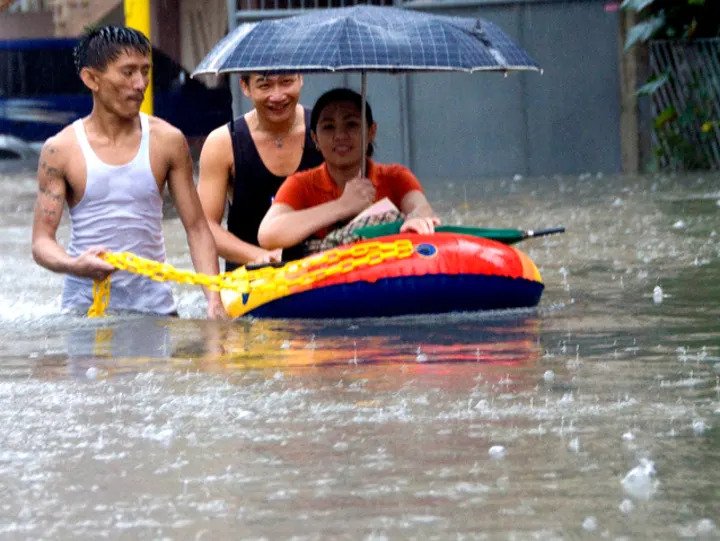 Woman on a Toy Floater photo by Dennison Uy