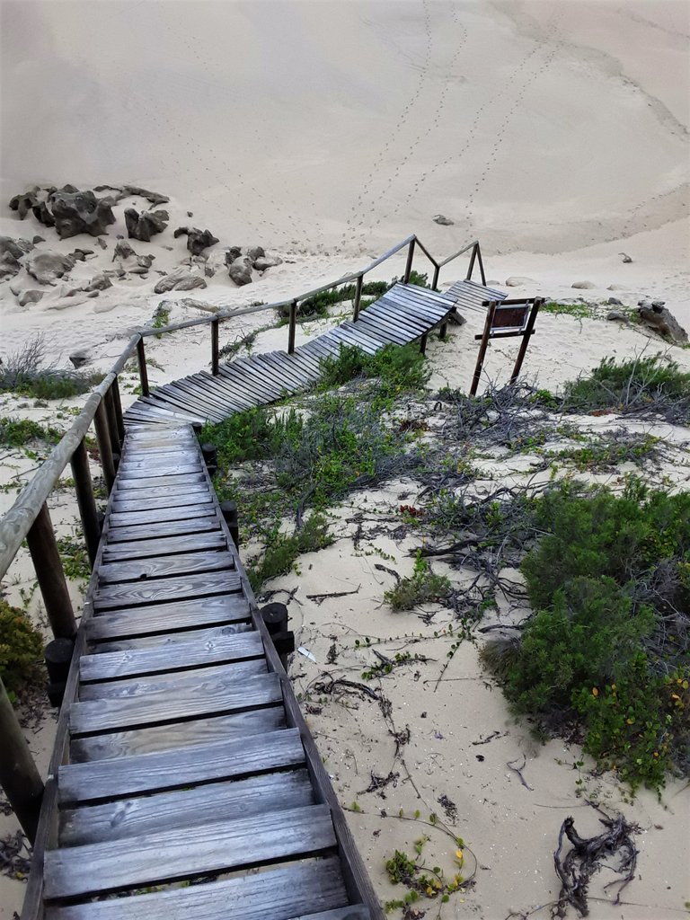 At the top of the Island wooden stairway