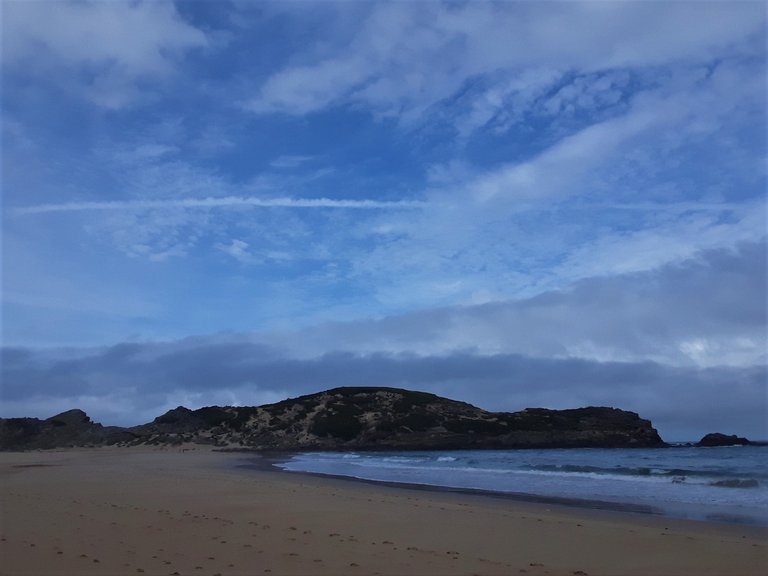 The Island ahead - notice the odd thin strip of cloud above