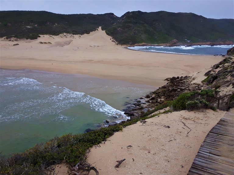 View of the thin sandbank that connects The Island to the peninsula