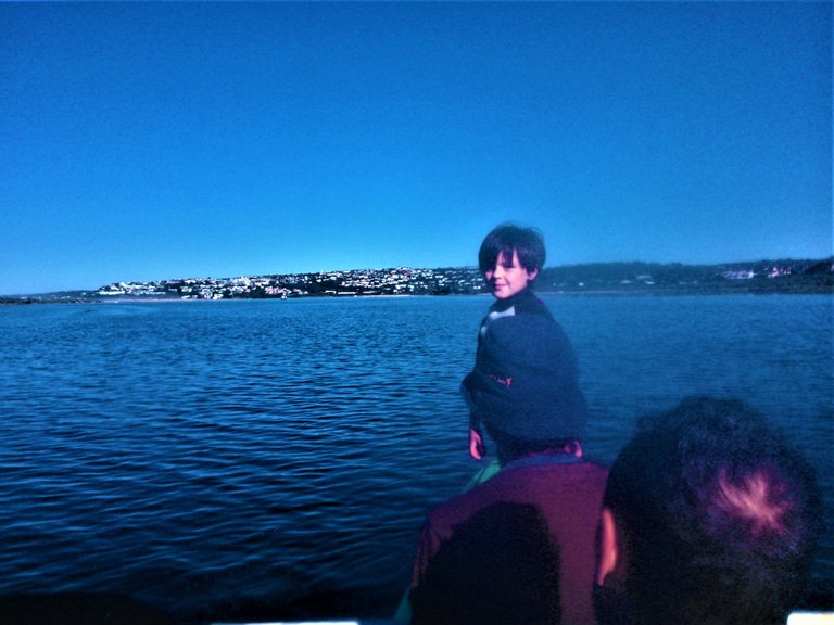 The son of my one friend at the front, with the holiday town of Plettenberg Bay in the background