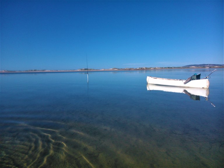 In some places the lagoon was shallow, though that didn’t stop eager fishermen from casting their line