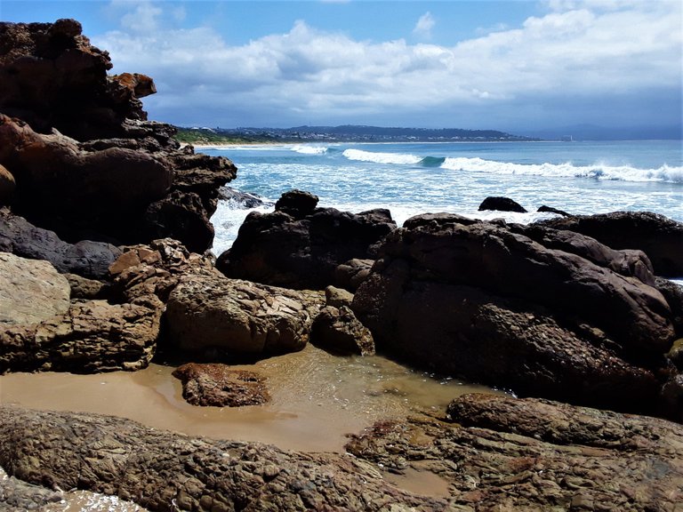 A hidden cove at the far end of Robberg beach in Plettenberg Bay.