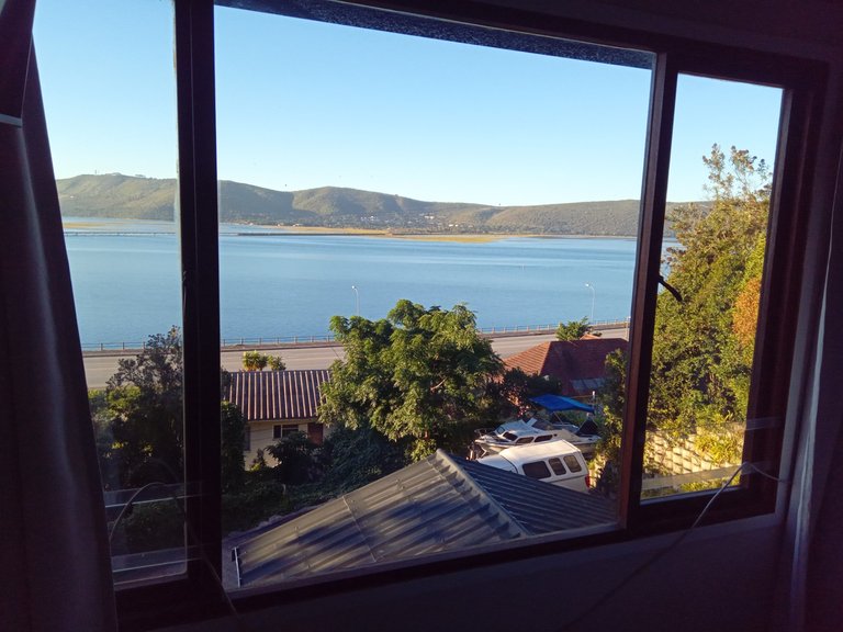 Another angle from the house with the best view, right on the lakeside. The main highway runs right along the lake, as you see, though is relatively quiet during the day, with almost no traffic at night.