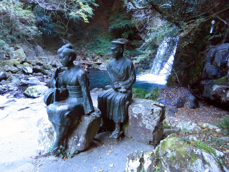 The dancer and the author as a schoolboy with one of the seven waterfalls behind