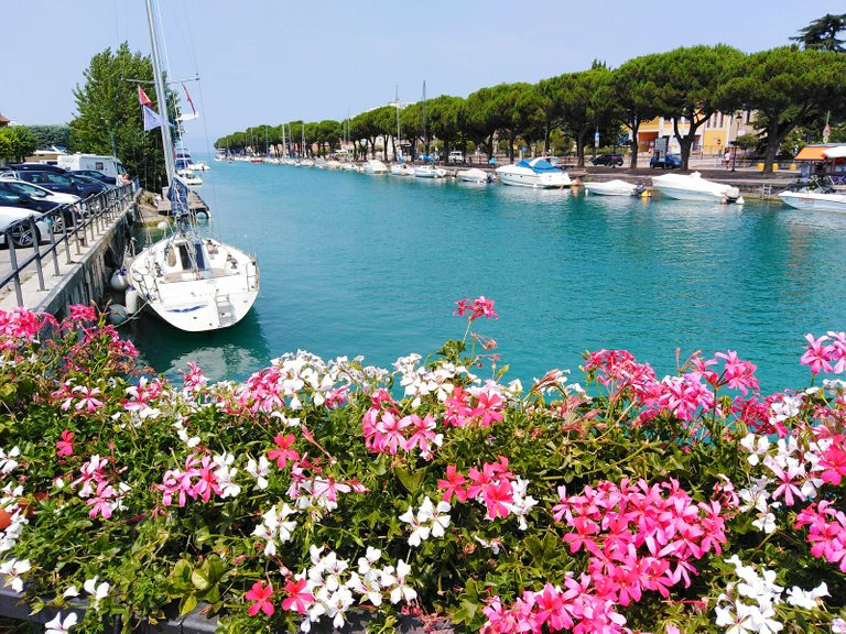 A beautiful view from the harbour in Peschiera del Garda over a part of Lake Garda!