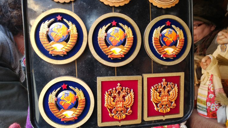 The soviet symbol and the double eagle of Russia