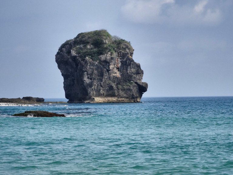 A giant rock at the beach