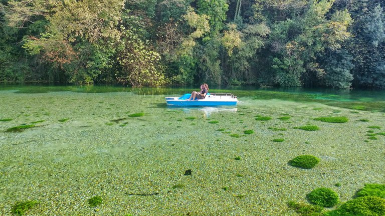 Trampling on a boat over crystal clear water