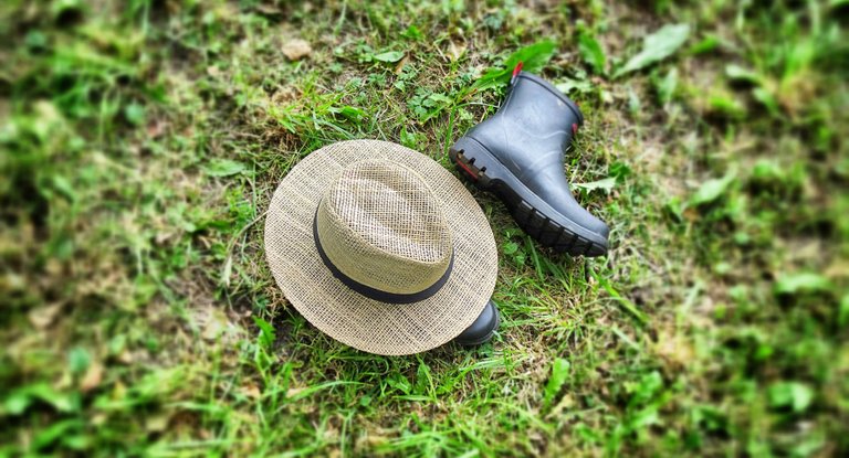 A hat and rubber boots