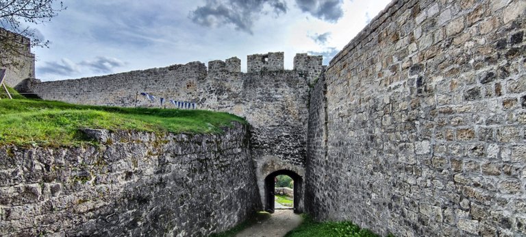 Only this narrow door opens the fortress