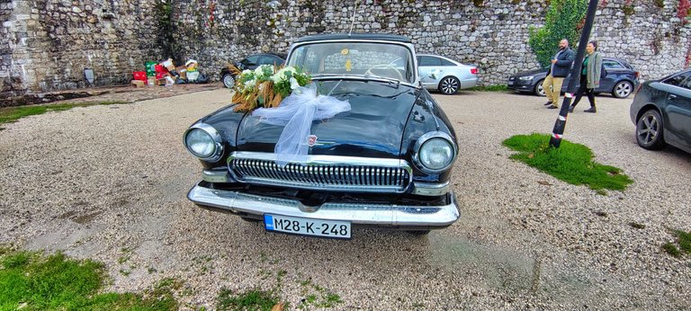 EWedding party with an old russian Wolga car