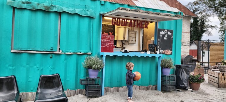 It’s a sandy playground with small food shops