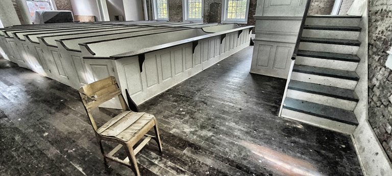 A chair is waiting for someone who will sit down