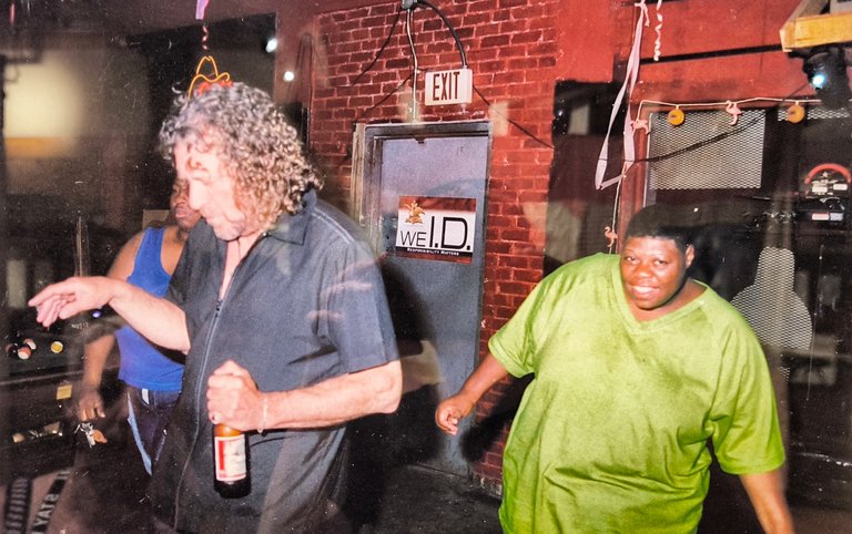 Robert Plant of Led Zeppelin while a visit at the museum, dancing