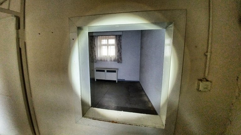 A room with an inside window