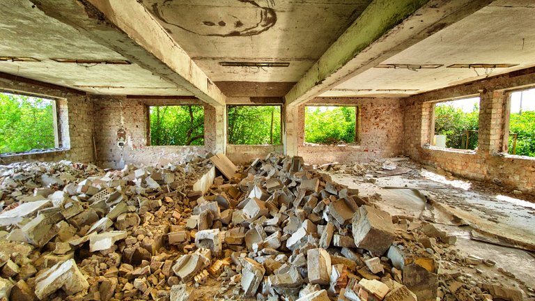 Inside a building that once was a dining room, maybe?