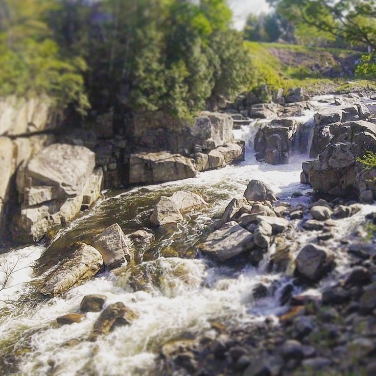 The campsite is a few meters from this rolling river.