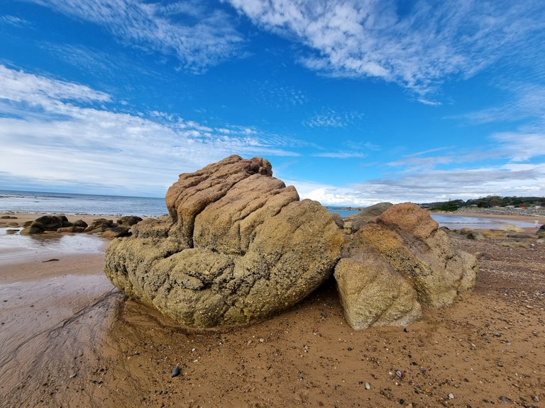 Awesome rock formations on the beach at low tide.