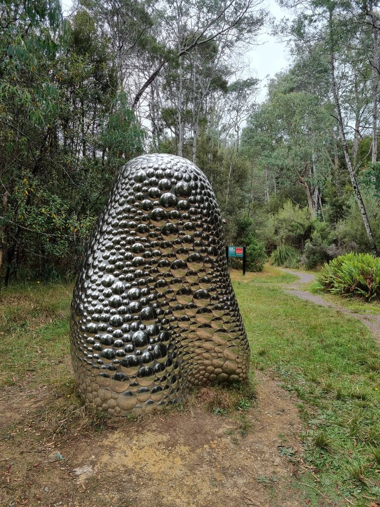 It took a while for me to workout what the artist was trying to to convey with their big shiny, silver thing in the middle of the wilderness. But maybe it’s all the pebbles in the creek, all the big rocks and silver mines around the western area of Tasmania.