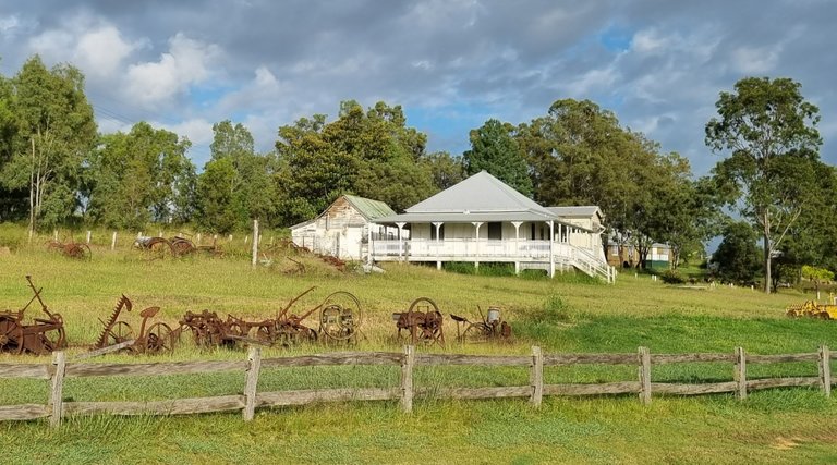 An old Queenslander House and farm equipment - all part of the Gatton and District Historical Society Museum.