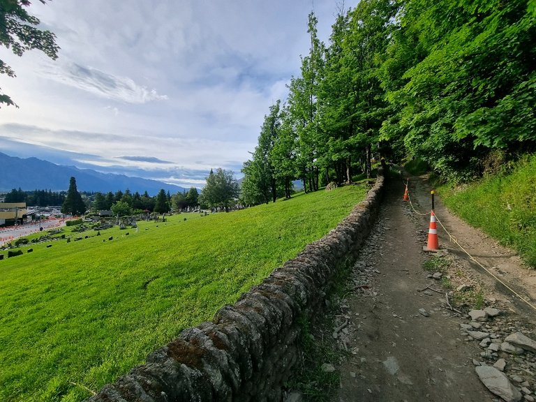The start of the Tiki trail just above Queenstown Cemetery. The rope and cones are to separate the mountain bike trail.