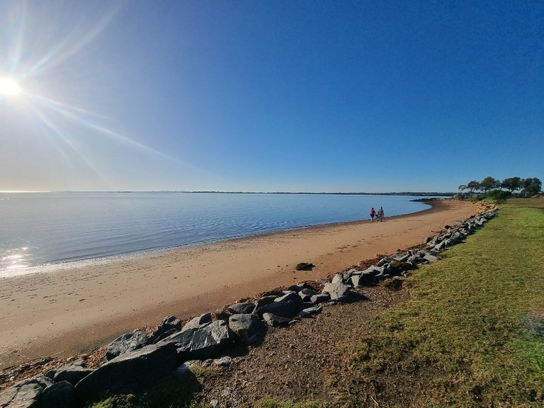 The lack of wind made for pan cake flat water on the bay. This little stretch of sand is called Lota dog beach or it is what the locals and I have always known it as. A place where you can let your dog run off leash. There were not any dogs on this particular morning but I have see it quite busy before.