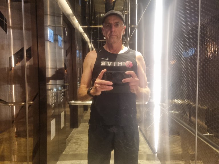 The mirrored lift after one of my morning runs.