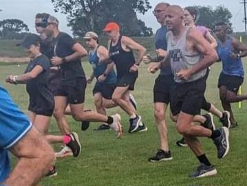 photo credit of me running to the parkrun volunteer photographer.