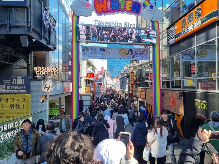 I had never heard of Takeshita Street but it was even more full on than Shibuya Crossing. A closed off street mall full the latest trendy shopping and people everywhere. Everyone was taking photos of the live screen feed just under the Welcome to Winter Sign, Including me LOL.