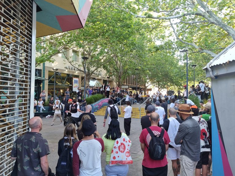 An illegal pop up skate boarding competition in the city civic walk mall.