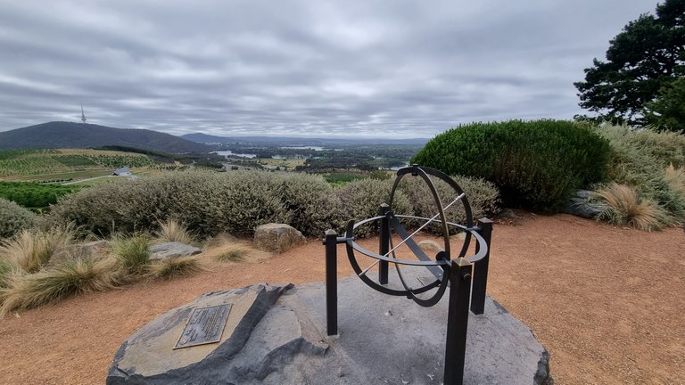 Dairy Farmer Hill lookout named after the cows that used to be in the area. probably the best lookout on Canberra and its surrounds. The lookout, Amillary Sphere Sundial and Eagles nest sculpture are all within the grounds of the National Arboretum.