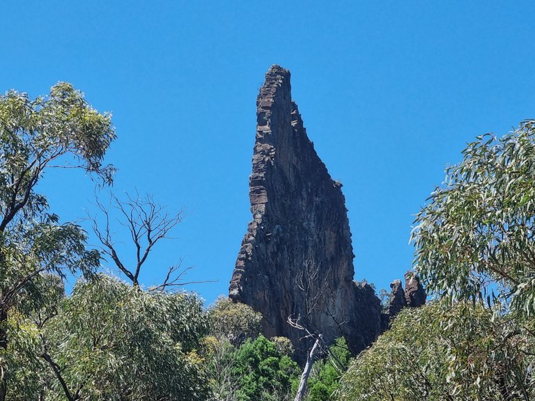 A close up of the breadknife on the way down.