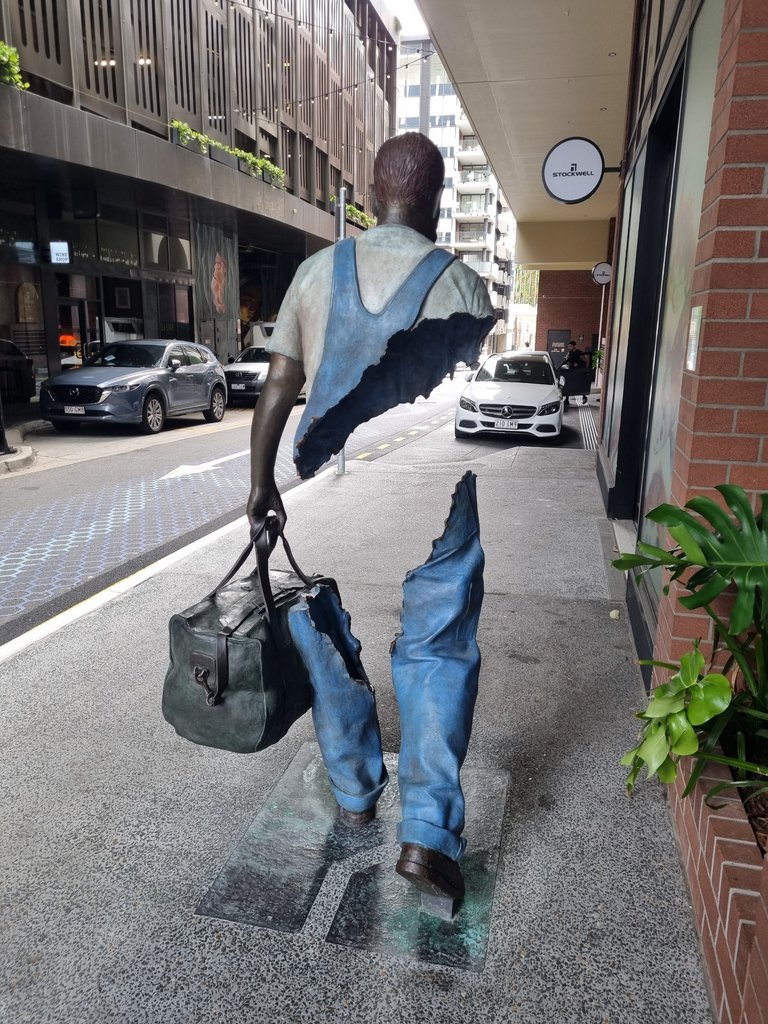 I loved all the art work and it is way cleaner than the old days. They could have modeled this sculpture off me walking to work with all my tools all those years ago.