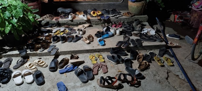 The amount of shoes at the entrance to the Reggae Bar tells how popular it is