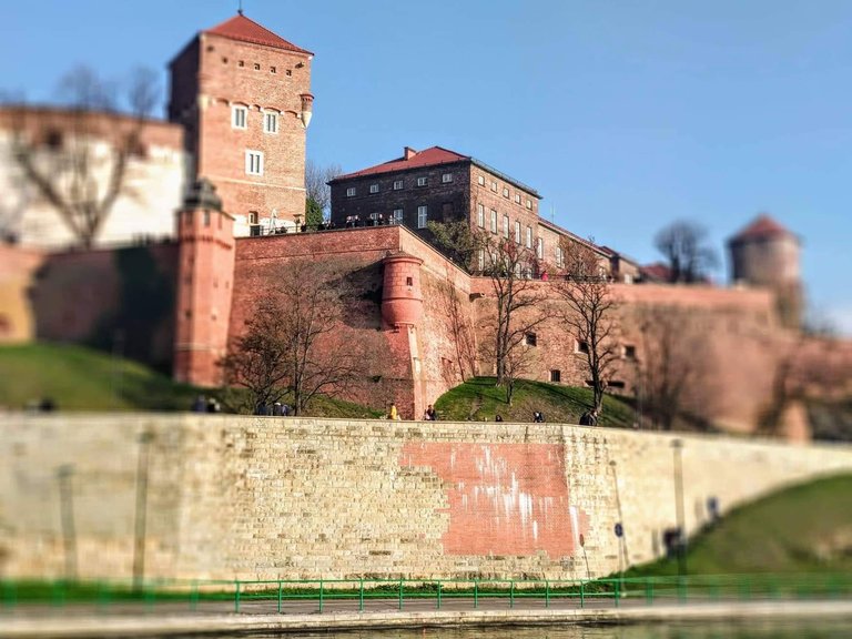 Breathtaking views of the Wawel Castle while walking on a boat along the Vistula River