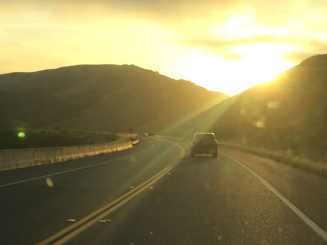 Sun going down while driving the last miles of the