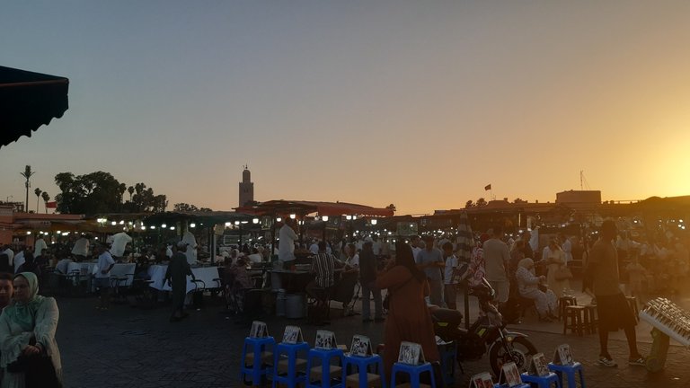 As the sun sets, the central square gains even more life.