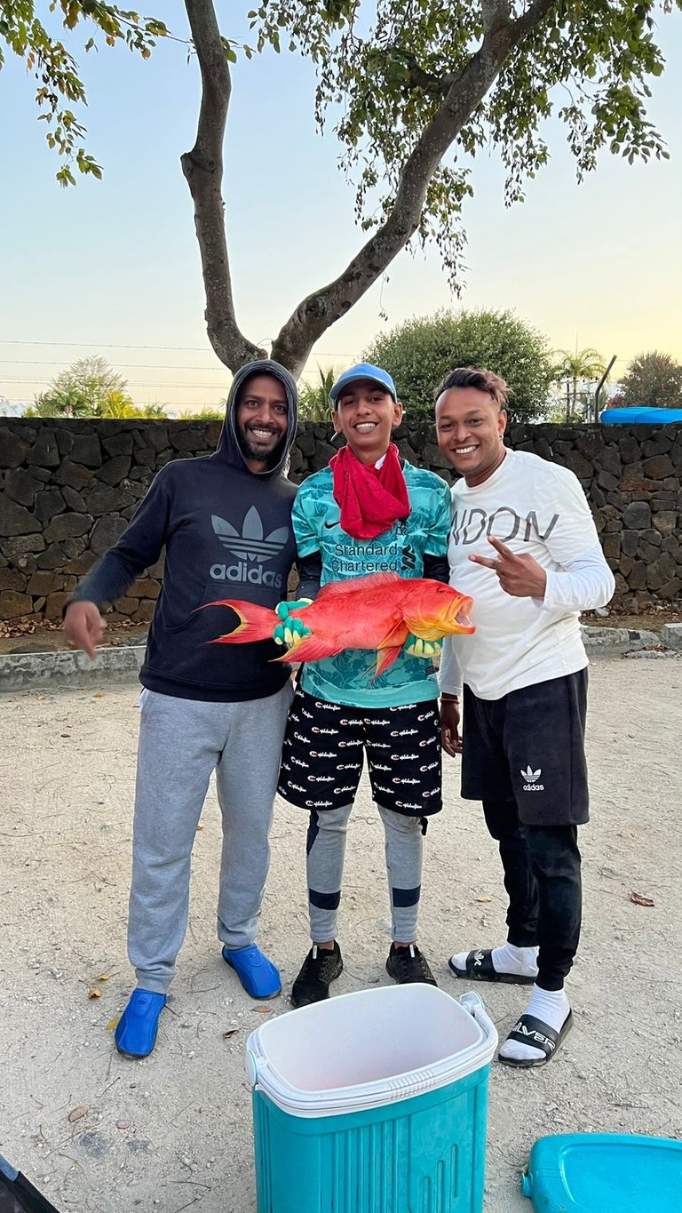 I am on the left and my chef Niven on the right with Zubair holding our biggest catch of the day when we were back...