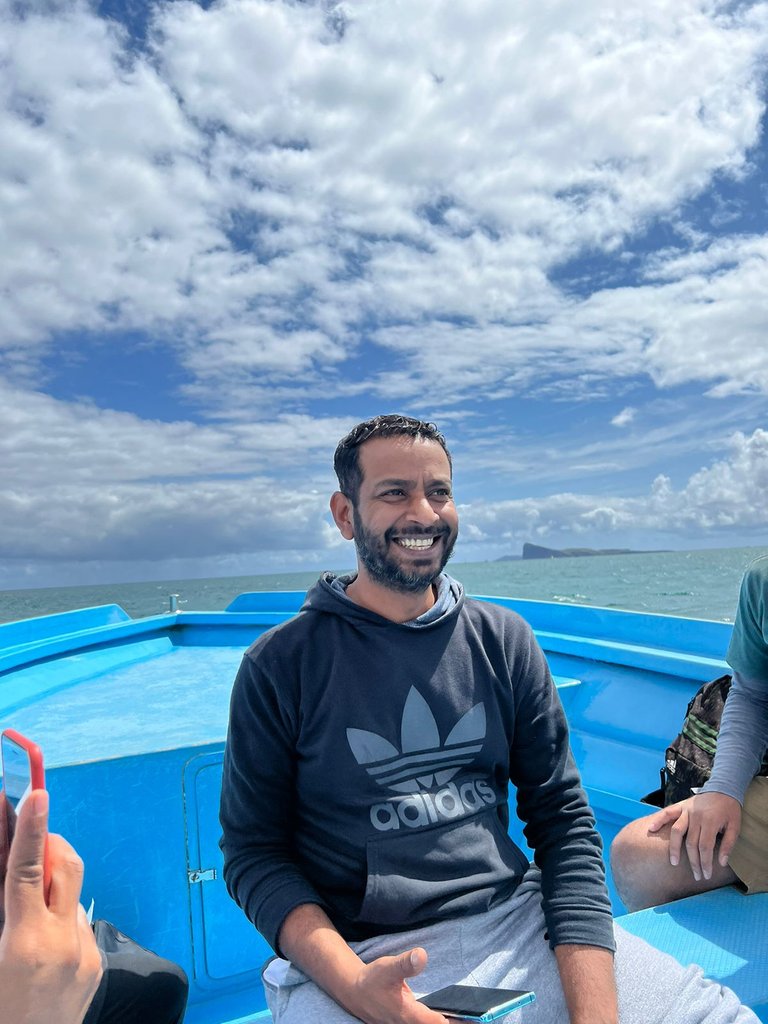 We were all so happy when the trip started...check out how I am smiling and the Gunner’s Quoin island in the back!