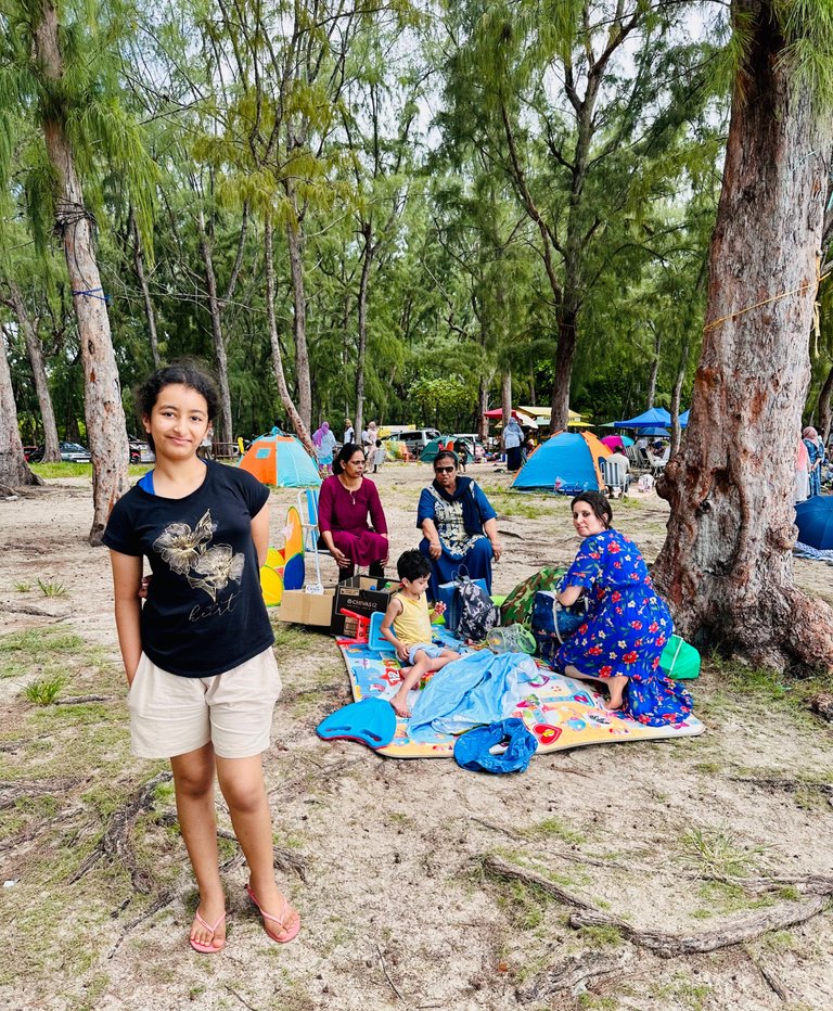 My daughter Rheem in front, while Omar, my wife, my mum and sister sitting under the filao tree!