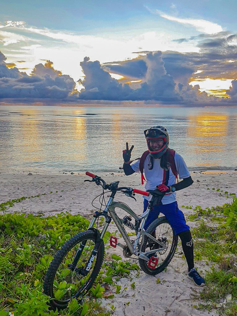 Beach sunset after an awesome, asphalt downhill.