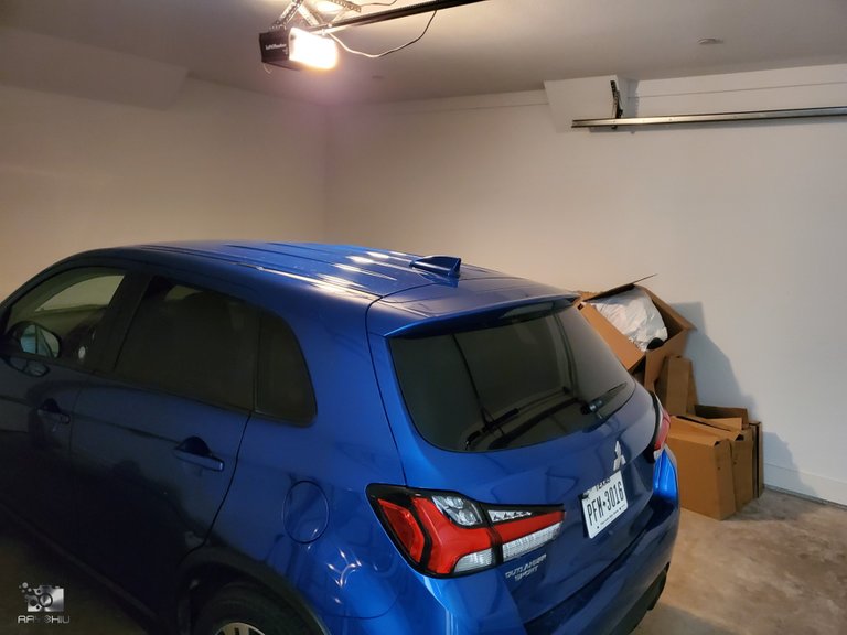 Mitsubishi Outlander Sport in the garage.