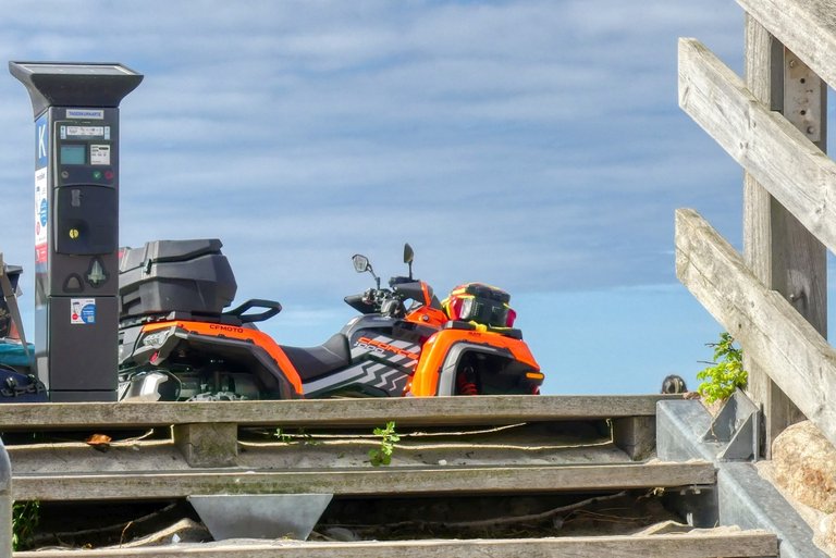 Wooden stairs. The ATV belongs to the Sea Rescue Service