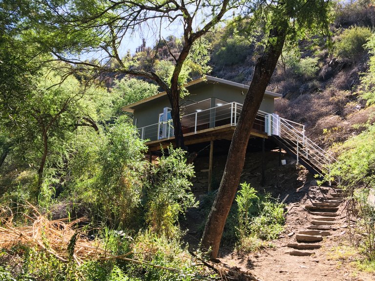 Nestled on a breathtaking farm in the serene Groenfontein Valley, just outside Calitzdorp, The Hangman’s Lookout is a self-catering cottage that promises an idyllic escape. This hidden gem in the Klein Karoo invites you to unwind amid complete privacy and nature’s embrace. As you journey down the gravel road, past the charming Homestead and across the paddock, you’ll cross a picturesque bridge and ascend the hill before finding your mountain sanctuary. With stunning views and delightful walking and hiking trails right at your doorstep, this haven is perfect for those seeking tranquility and adventure in equal measure.