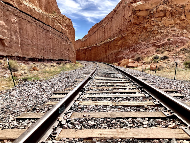Historic railway track nestled in the red rock canyons