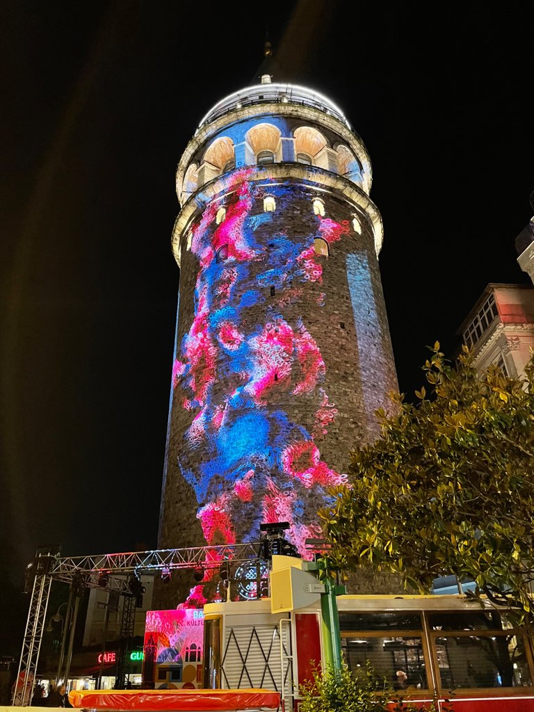 The Galata Tower bathed in mystical light during an artistic light installation