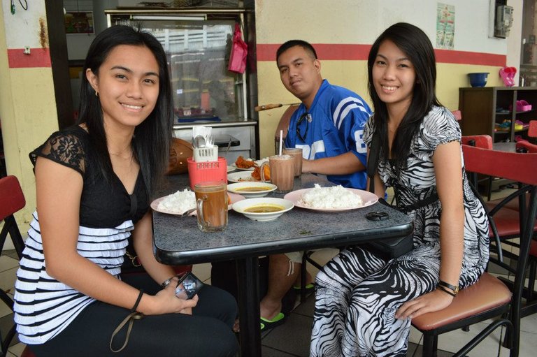 My beautiful siblings and I eating our breakfast