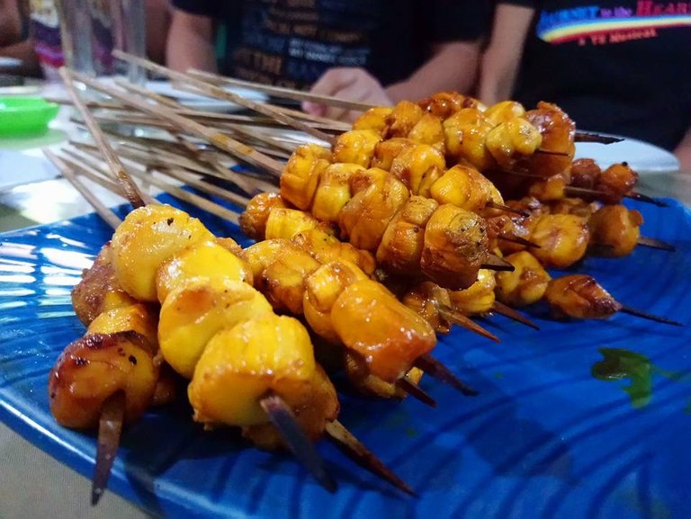 Grilled scallops on sticks