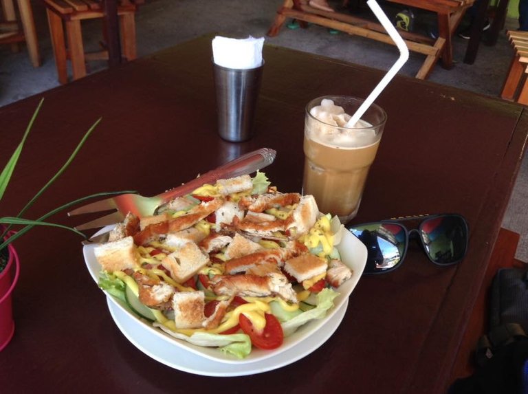 Vegan mode with chicken caesar salad and iced coffee